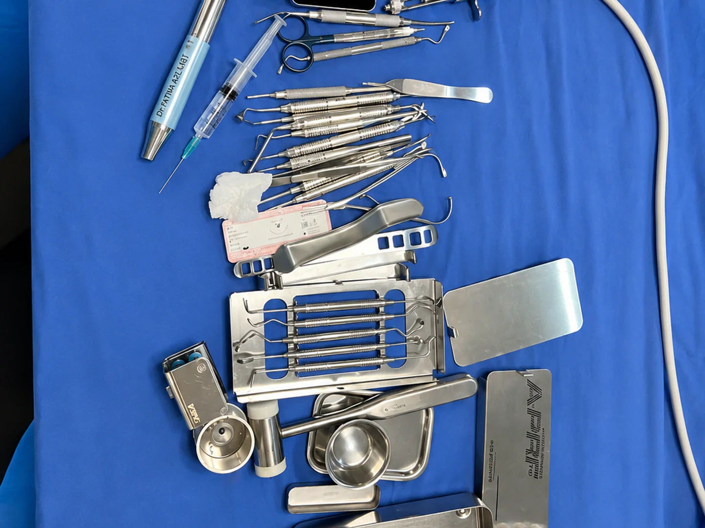 Surgical and implant instruments arranged on a sterile tray before the procedure